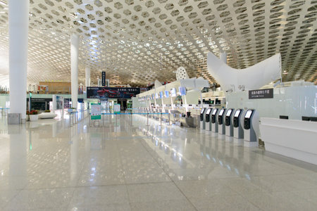 SHENZHEN - APRIL 16: airport interior on April 16, 2014 in Shenzhen, China. Shenzhen Bao'an International Airport is located near Huangtian and Fuyong villages in Bao'an District, Shenzhen, Guangdongのeditorial素材