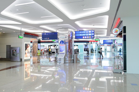 DUBAI, UAE - MARCH 31: airport interior on March 31, 2014 in Dubai. Dubai International Airport is an international airport serving Dubai. It is a major airline hub in the Middle East, and is the main airport of Dubai.のeditorial素材