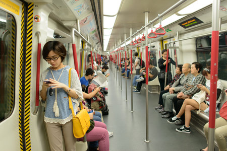 HONG KONG - APRIL 22: metro interior in Hong Kong, China on 22 April 2014. The Mass Transit Railway...