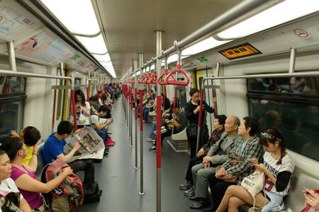 HONG KONG - APRIL 22: metro interior in Hong Kong, China on 22 April 2014. The Mass Transit Railway (MTR) is the rapid transit railway system in Hong Kong It is one of the most profitable systems in the worldのeditorial素材