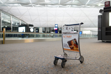 HONG KONG - APRIL 22: baggage trolley in airport on April 22, 2014 in Hong Kong. Hong Kong International Airport  is one of the best airport in the annual passenger survey by Skytrax.のeditorial素材
