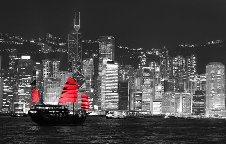 HONG KONG - NOV 10 : Ferry cruising Victoria harbor with Hong Kong skyline in the background on November 10, 2011 in Hong Kong, China. Hong Kong has many nicknames, but the most famous is "Pearl of the orient"のeditorial素材