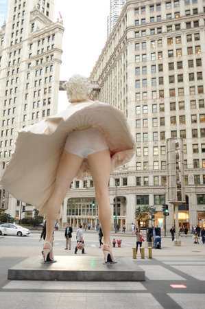 CHICAGO, USA - OCT 06:  statue of Marilyn Monroe in Chicago on October 06, 2011 in Chicago, USA. Created by artist Seward Johnson, statue is based around Monroe's iconic "Seven Year Itch" subway grate moment.のeditorial素材