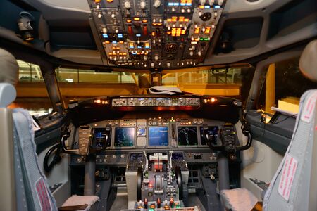 HONG KONG, CHINA - MAY 12, 2014: Malaysian Airline Boeing 737 cockpit interior on MAY 12, 2014....