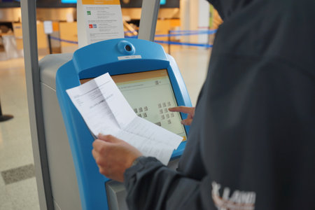 HELSINKI - SEP 03: self check-in kiosks in Helsinki Airport on September 03, 2014 in Helsinki,...