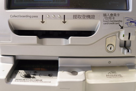 HONG KONG, CHINA - OCTOBER 06: check-in kiosks in Hong Kong International Airport on October 06, 2013 in Hong Kong, China. The one of the best airport in the annual passenger survey by Skytrax.のeditorial素材