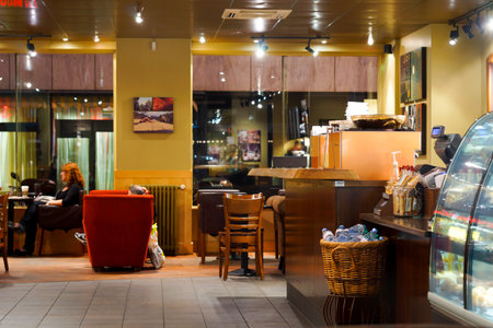 GENEVA - SEP 15: Starbucks cafe interior on September 15, 2014 in Geneva, Switzerland. Starbucks is the largest coffeehouse company in the world, with more then 23000 storesのeditorial素材