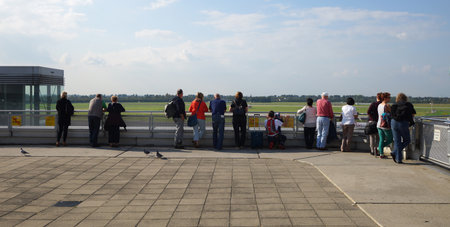 DUSSELDORF - SEPTEMBER 16: passengers on the roof of airport on September 16, 2014 in Dusseldorf,...