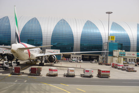 DUBAI, UAE - APRIL 23: Dubai International Airport on April 23, 2013 in Dubai, UAE. Dubai International Airport is a major airline hub in the Middle East, and is the main airport of Dubaiのeditorial素材