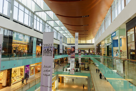 DUBAI - OCTOBER 15: The Dubai Mall linterior on October 15, 2014 in Dubai, UAE. The Dubai Mall located in Dubai, it is part of the 20-billion-dollar Downtown Dubai complex, and includes 1,200 shops.のeditorial素材
