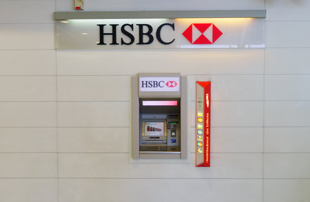 PARIS - SEPTEMBER 10: HSBC ATM on September 10, 2014 in Paris, France. HSBC Holdings plc is a British multinational banking and financial services company headquartered in London, United Kingdom. It is the world's second largest bankのeditorial素材