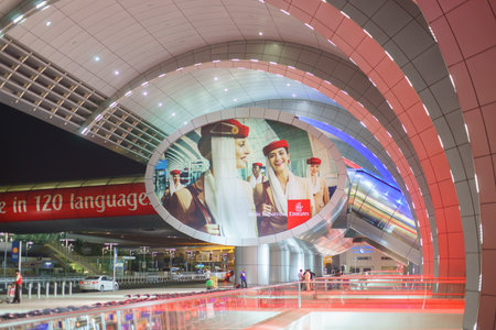 DUBAI, UAE - MARCH 26: Dubai Airport entrance on March 26, 2013. It is world largest building by...