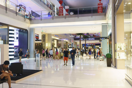 DUBAI - OCTOBER 13: The Dubai Mall linterior on October 13, 2014 in Dubai, UAE. The Dubai Mall located in Dubai, it is part of the 20-billion-dollar Downtown Dubai complex, and includes 1,200 shops.のeditorial素材
