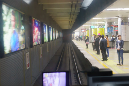 BEIJING-APRIL 26: Passengers in subway station on April 26, 2013 in Beijing, China. Beijing's 14 subway lines carry over 8.5 million passengers on an average weekday.のeditorial素材