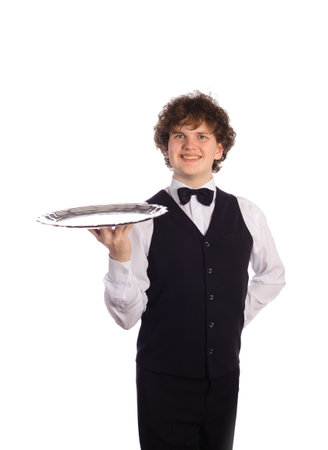 young handsome waiter with tray, isolated on whiteの写真素材