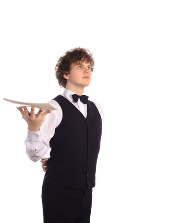 Posing waiter with empty trayの写真素材