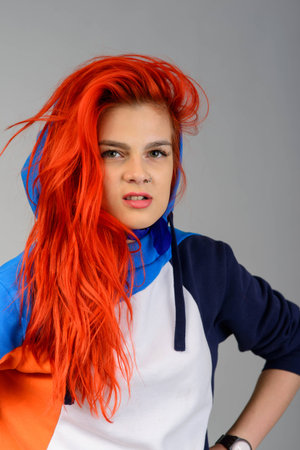 Studio shot of young beauty girl in casual sport style clothing
