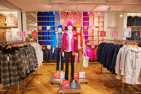 HONG KONG - DECEMBER 25, 2015: interior of Uniqlo store. Uniqlo Co., Ltd. is a Japanese casual wear...