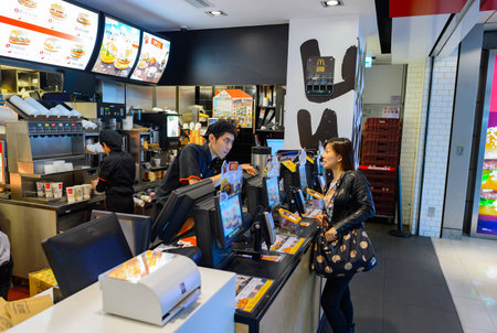 HONG KONG - DECEMBER 25, 2015: interior of McDonald's restaurant. McDonald's is the world's largest chain of hamburger fast food restaurants, founded in the United States.のeditorial素材