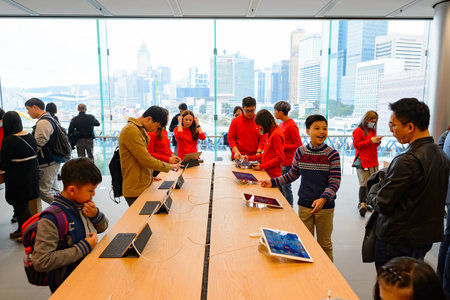 HONG KONG - DECEMBER 25, 2015:  interior of Apple store. Apple Inc. is an American multinational technology company headquartered in Cupertino, California, that designs, develops, and sells consumer electronics, computer software, and online services.のeditorial素材