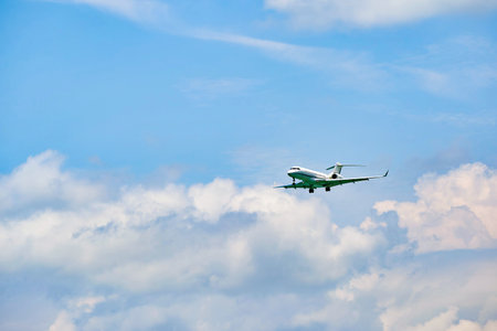 HONG KONG - JUNE 04, 2015: The Bombardier Global Express aircraft landing at Hong Kong airport. The...