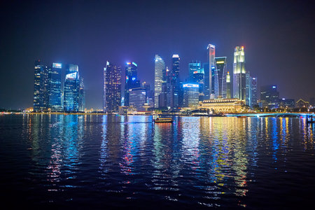 SINGAPORE - NOVEMBER 08, 2015: Singapore downtown at night. Singapore, officially the Republic of Singapore, and often referred to as the Lion City, the Garden City, and the Red Dot, is a leading global city in Southeast Asia and the world's only island cのeditorial素材