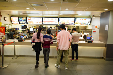 HONG KONG - DECEMBER 24, 2015: interior of McDonald's restaurant. McDonald's is the world's largest...