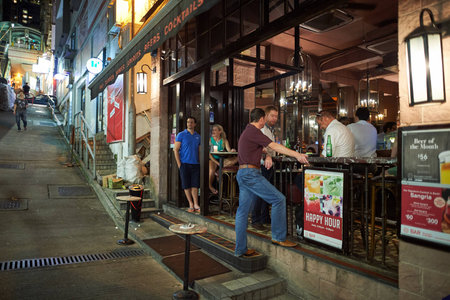 HONG KONG - JUNE 03, 2015: streets of Hong Kong at night. Hong Kong, is an autonomous territory on the southern coast of China at the Pearl River Estuary and the South China Seaのeditorial素材