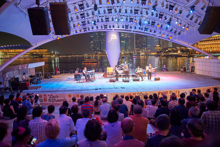 SINGAPORE - NOVEMBER 08, 2015: concert at night. Singapore, officially the Republic of Singapore, and often referred to as the Lion City, the Garden City, and the Red Dot, is a leading global city in Southeast Asia and the world's only island city-state.のeditorial素材