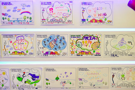 HONG KONG - NOVEMBER 16, 2015: close up shot of stand with pictures in Hong Kong International Airport. It is the main airport in Hong Kong. The airport is located on the island of Chek Lap Kokのeditorial素材