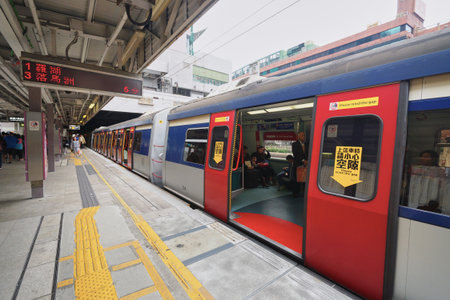 HONG KONG - DECEMBER 26, 2015: The Mass Transit Railway station. MTR is the rapid transit railway...