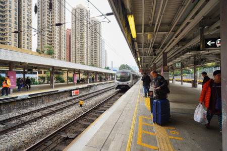HONG KONG - DECEMBER 26, 2015: The Mass Transit Railway station. MTR is the rapid transit railway...