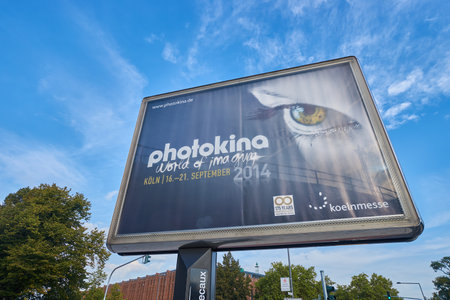 COLOGNE, GERMANY - SEPTEMBER 19, 2014: Photokina advertisement. The Photokina is the world's largest trade fair for the photographic and imaging industriesのeditorial素材