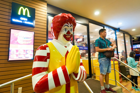 PATTAYA, THAILAND - FEBRUARY 18, 2016: Ronald McDonald character near McDonald's restaurant. Ronald McDonald is a clown character used as the primary mascot of the McDonald's fast-food restaurant chain.のeditorial素材
