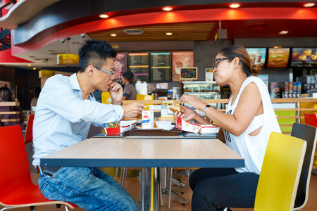 PATTAYA, THAILAND - FEBRUARY 25, 2016: people eat at McDonald's restaurant. McDonald's primarily sells hamburgers, cheeseburgers, chicken, french fries, breakfast items, soft drinks, milkshakes, and dessertsのeditorial素材