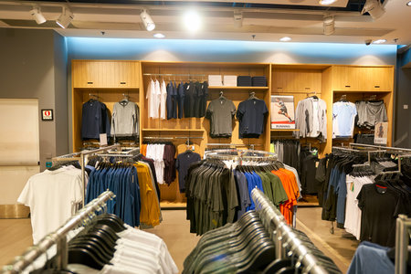 HONG KONG - JANUARY 26, 2016: inside of H&M store at Elements Shopping Mall. H&M is a Swedish multinational retail-clothing company, known for its fast-fashion clothing for men, women, teenagers and children.のeditorial素材