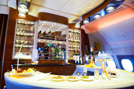 DUBAI, UAE - MARCH 31, 2015: interior of Emirates Airbus A380. Emirates is one of two flag carriers of the United Arab Emirates along with Etihad Airways and is based in Dubai.のeditorial素材