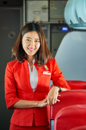 PATTAYA, THAILAND - FEBRUARY 26, 2016: crew member of Thai AirAsia A320. Thai AirAsia is a joint venture of Malaysian low-fare airline AirAsia and Thailand's Asia Aviationのeditorial素材