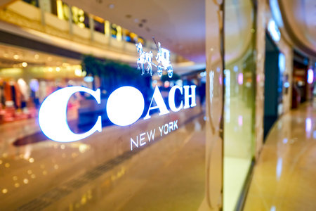 HONG KONG - JANUARY 27, 2016: Coach logo on the wall at Elements Shopping Mall. Coach, Inc. is an...