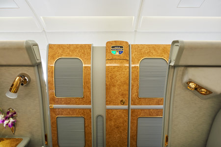 BANGKOK, THAILAND - MARCH 31, 2015: interior of Emirates Airbus A380. Emirates is one of two flag carriers of the United Arab Emirates along with Etihad Airways and is based in Dubai.のeditorial素材