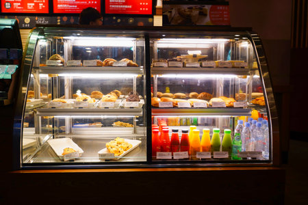 SHENZHEN, CHINA - FEBRUARY 05, 2016: interior of Starbucks Cafe. Starbucks Corporation is an American global coffee company and coffeehouse chain based in Seattle, Washingtonのeditorial素材