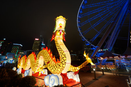 HONG KONG - JANUARY 25, 2016: area around Ferris Wheel in Hong Kong at night. The Hong Kong Observation Wheel is located in Central, Hong Kong.のeditorial素材