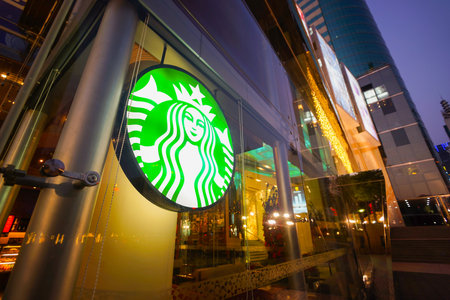 SHENZHEN, CHINA - FEBRUARY 05, 2016: facade of Starbucks Cafe. Starbucks Corporation is an American global coffee company and coffeehouse chain based in Seattle, Washingtonのeditorial素材
