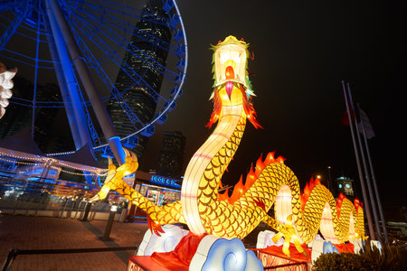 HONG KONG - JANUARY 25, 2016: area around Ferris Wheel in Hong Kong at night. The Hong Kong Observation Wheel is located in Central, Hong Kong.のeditorial素材