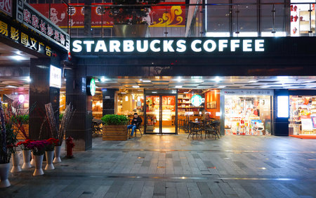 SHENZHEN, CHINA - FEBRUARY 05, 2016: facade of Starbucks Cafe. Starbucks Corporation is an American global coffee company and coffeehouse chain based in Seattle, Washingtonのeditorial素材