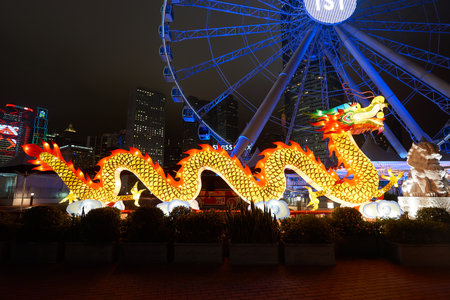 HONG KONG - JANUARY 25, 2016: area around Ferris Wheel in Hong Kong at night. The Hong Kong Observation Wheel is located in Central, Hong Kong.のeditorial素材