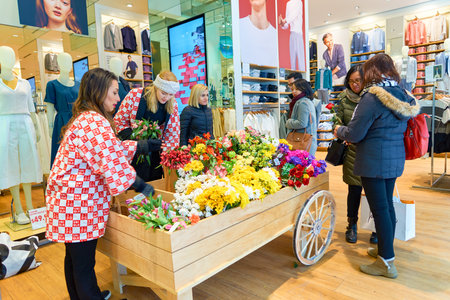 NEW-YORK - MARCH 20, 2016: inside of Uniqlo store. Uniqlo Co., Ltd. is a Japanese casual wear designer, manufacturer and retailer.のeditorial素材