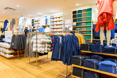 NEW-YORK - MARCH 20, 2016: inside of Uniqlo store. Uniqlo Co., Ltd. is a Japanese casual wear designer, manufacturer and retailer.のeditorial素材