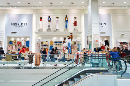 NEW YORK - MARCH 19, 2016: inside of Forever 21 in New-York. Forever 21 is an American chain of fast fashion retailers with its headquarters in Los Angeles.のeditorial素材