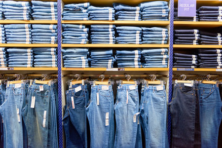 NEW-YORK - MARCH 20, 2016: inside of Uniqlo store. Uniqlo Co., Ltd. is a Japanese casual wear designer, manufacturer and retailer.のeditorial素材